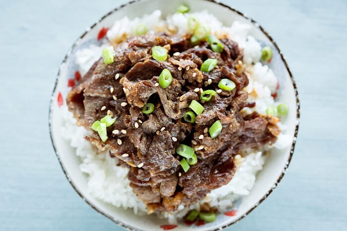 Bowl Of Beef Served Over Rice