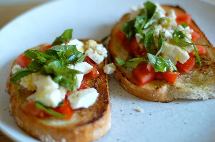 Bruschetta With Mozzarella, Basil And Tomatoes
